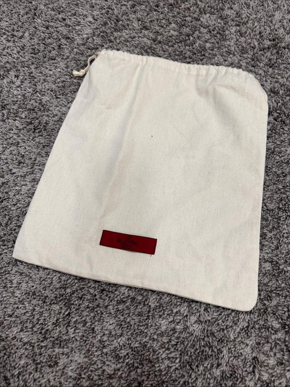 Valentino Garavani Cream Drawstring Dust Bag with Red Logo Patch